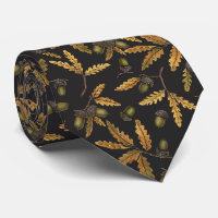 Acorns and oak leaves on black