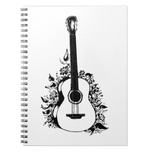 Acoustic guitar on a background of flowers. sleev notebook