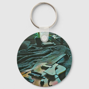 Acoustic guitar player key ring