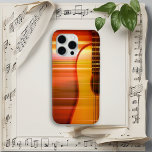 Acoustic Sunset Guitar iPhone 15 Pro Max Case<br><div class="desc">Embrace the captivating fusion of a majestic sunset's warm tones,  artfully melded with the stylish curves of a guitar. An ideal choice for music lovers seeking an elegant blend of art and functionality.</div>