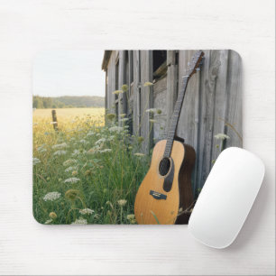 Acoustical Guitar Leaning on a Country Barn Mouse Mat