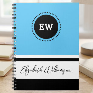 Add initials and name blue and black notebook