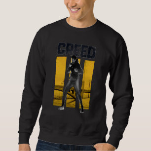 Adonis Creed Pose with III Yellow Sweatshirt