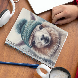 Adorable alpaca wearing blue beanie notebook