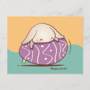 Adorable Bunny laying on a Purple Easter Egg Postcard