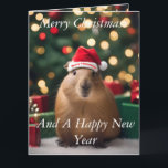 Adorable Christmas Capybara, Big Christmas Card<br><div class="desc">This image captures the cozy,  holiday scene with the capybara in a Santa hat,  surrounded by presents and a dreamy bokeh backdrop.</div>