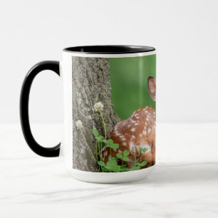Adorable Fawn laying under a tree Mug