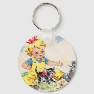 adorable little girl with adorable little kitten key ring