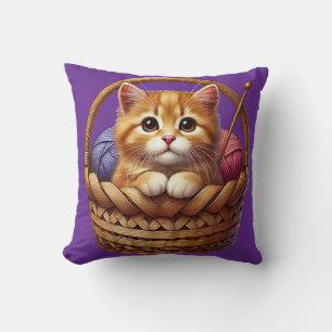 Adorable Orange Kitten in Basket With Yarn Cushion