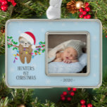 Adorable Sleeping Sloth First Christmas Photo Silver Plated Framed Ornament<br><div class="desc">Cute little sleeping sloth dressed in a santa hat hanging out on a holly branch baby's First Christmas Ornament. . Matching items available in our shop.</div>