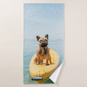 Adult brown French bulldog standing on kayak Bath Towel