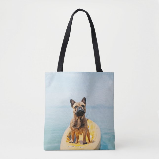 Adult brown French bulldog standing on kayak Tote Bag (Front)