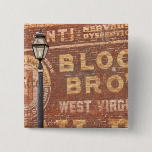 Advertisements on side of building 15 cm square badge