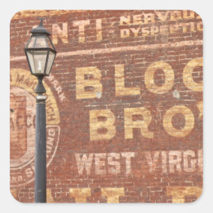 Advertisements on side of building square sticker