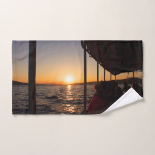 Aegean lifestyle on boat at sunset in summer hand towel