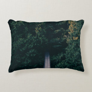 AERIAL PHOTOGRAPHY OF HANGING BRIDGE NEAR TREES DECORATIVE CUSHION