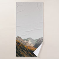 AERIAL PHOTOGRAPHY OF MOUNTAIN UNDER CLOUDY SKY
