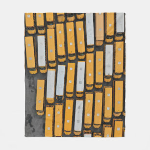 Aerial photography of white and yellow buses fleece blanket