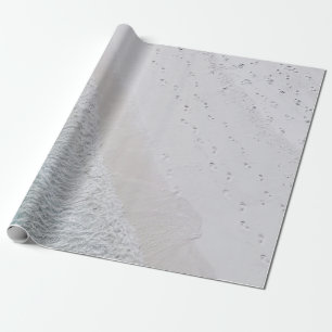 AERIAL PHOTOGRAPHY OF WHITE SAND SEASHORE AND GREE WRAPPING PAPER