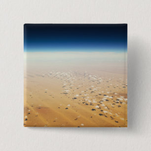 Aerial view of a desert 15 cm square badge