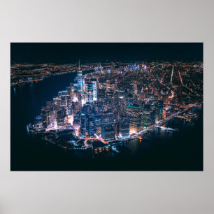 AERIAL VIEW OF CITY BUILDINGS DURING NIGHTTIME POSTER