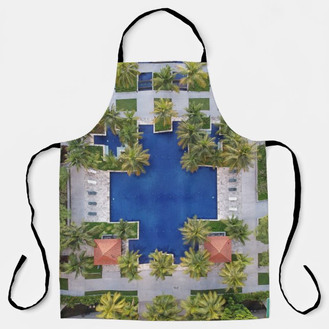 Aerial view of pool surrounded by palm trees apron (Front)