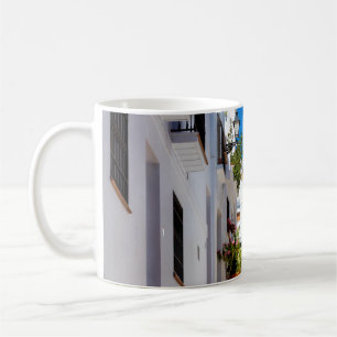 Aerial view of white city Frigiliana in sunny day  Coffee Mug