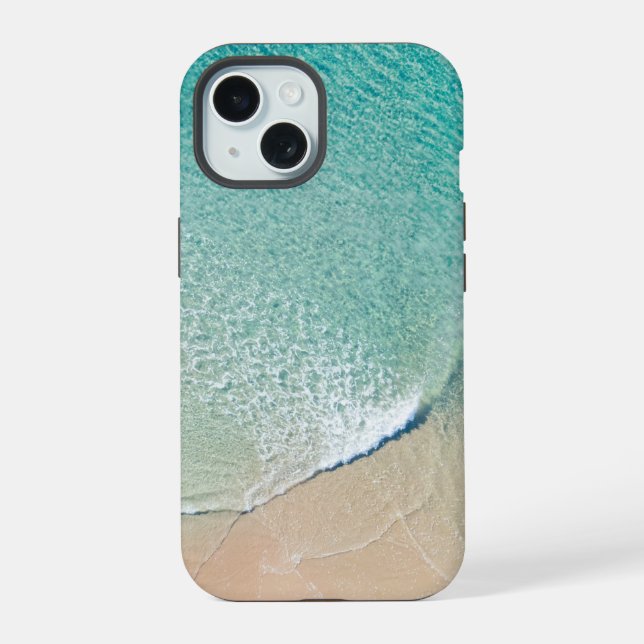 Aerial view over a beach and blue ocean iPhone 15 case (Back)