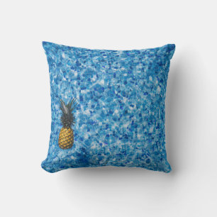 Aerial view photography of pineapple on body of wa cushion