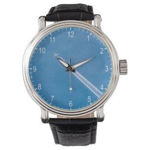 Aeroplane fly in the blue sky watch