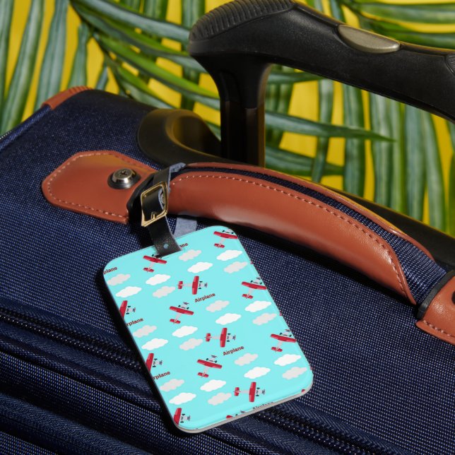 Aeroplane pattern on blue luggage tag (Front Insitu 1)