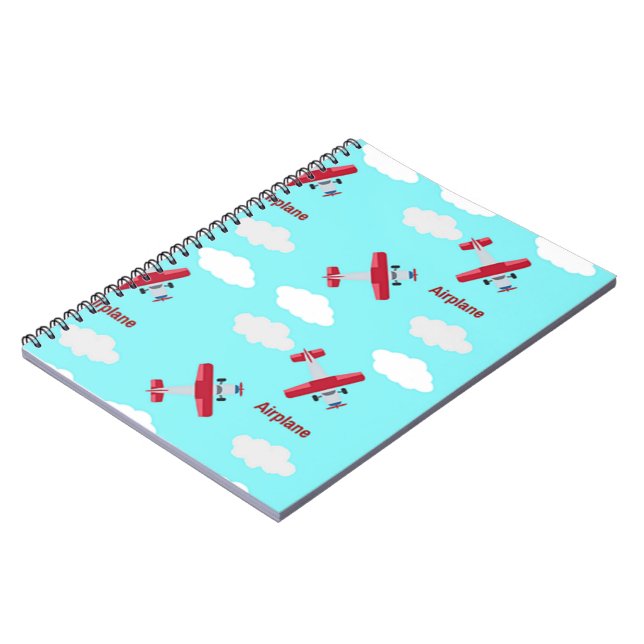 Aeroplane pattern on blue notebook (Left Side)