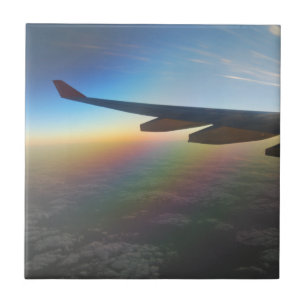 Aeroplane Wing against Colourful Setting Sun Tile