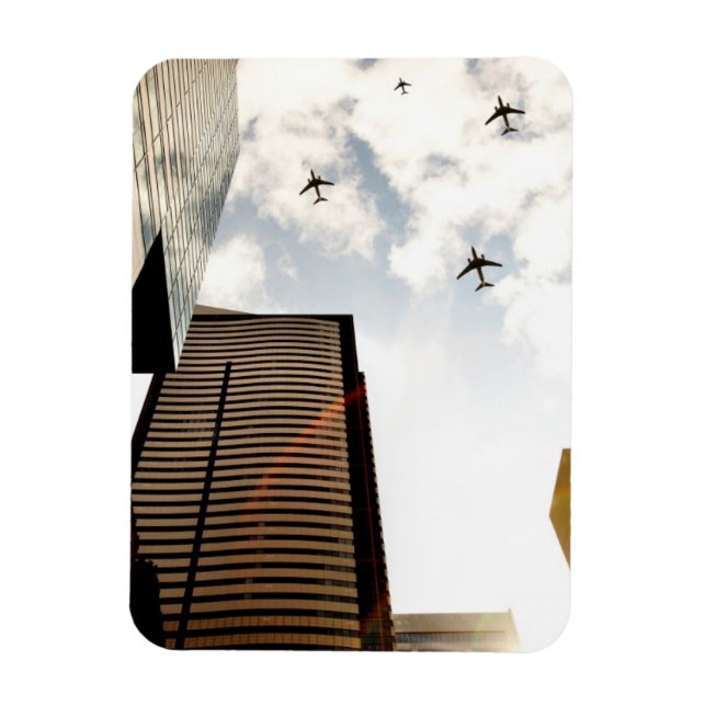 Aeroplanes flying over buildings magnet (Vertical)
