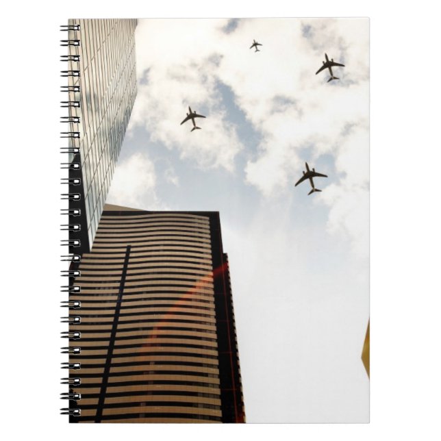 Aeroplanes flying over buildings notebook (Front)