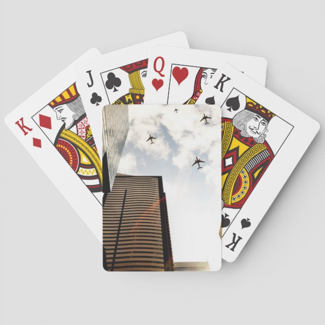 Aeroplanes flying over buildings playing cards (Back)