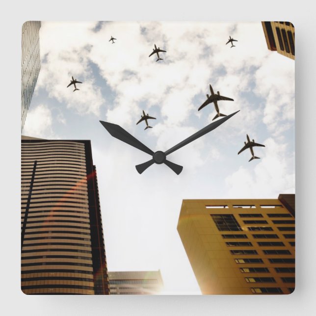 Aeroplanes flying over buildings square wall clock (Front)