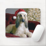 Afghan Hound With Santa Claus Hat Mouse Mat<br><div class="desc">A beautiful Afghan hound dog with long,  silky fur lounges on a red velvet couch,  wearing a festive Santa hat</div>