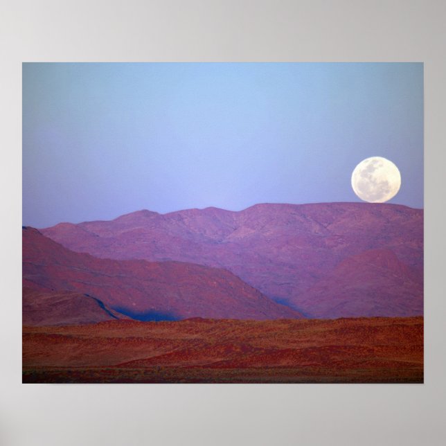 Africa, Namibia, Sossusvlei. A full moon rests Poster (Front)