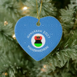 African Diaspora Angel Hanukkah Flag Personalized Ceramic Tree Decoration<br><div class="desc">Heart shaped ceramic ornament features an angel, dressed in the red, black, and green African American Flag, flies for Hanukkah in a white circle of squiggly squares. Background is blue squiggly squares. Designed especially for families of mixed religions, it reads HANUKKAH 202?. That should be changed to the correct year,...</div>