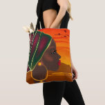 African woman and Savannah landscape sunset  Tote Bag<br><div class="desc">African tote bag,  Afro woman in turban looking at the savannah landscape at sunset,  Silhouettes of animals and plants,  nature of Africa. Reserves and national parks,  batik background</div>