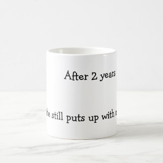 After two years she still puts up with me. coffee mug