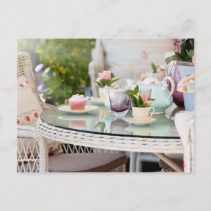 Afternoon tea and cakes in the garden postcard