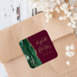 Agate Emerald Green Gold Script Burgundy Wedding Square Sticker<br><div class="desc">This elegant modern wedding sticker features an emerald green watercolor agate geode design trimmed with faux gold glitter. Easily customise the gold-coloured text on a burgundy background,  with the names of the bride and groom in whimsical handwriting calligraphy over a large ampersand.</div>