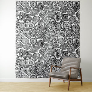Agate slices in black and white tapestry