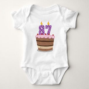 Age 87 on Birthday Cake Baby Bodysuit
