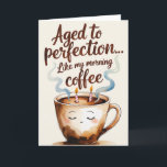 Aged to Perfection Coffee-Themed Birthday Card<br><div class="desc">Celebrate another year with a warm cup of humour! This cosy birthday card features the text “Aged to Perfection… Like My Morning Coffee” in a soft, hand-painted script. A charming watercolor-style coffee cup sits at the centre, with steam forming the shape of birthday candles. As the coffee level rises, the...</div>