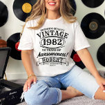 Aged To Perfection Personalised Vintage Birthday T-Shirt<br><div class="desc">Celebrate milestone birthdays with style and humour in our Aged to Perfection Personalised Vintage Birthday T-Shirt. Designed for whiskey-themed birthday parties, this shirt features a classic vintage look that resonates with timeless charm. Whether you're marking a 30th, 40th, 50th, or any special year, the "Aged to Perfection" motif captures the...</div>
