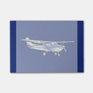 Aircraft Chrome Cessna Silhouette Flying on Blue Post-it Notes