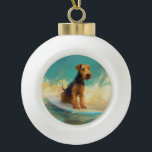 Airedale Beach Surfing Painting  Ceramic Ball Christmas Ornament<br><div class="desc">Immerse yourself in the playful world of canine adventure with this captivating painting. A spirited dog takes to the waves, skilfully riding the surf on a sun-kissed beach. The vibrant artwork beautifully captures the essence of beachside excitement as the dog fearlessly rides the waves, embodying the spirit of fun and...</div>